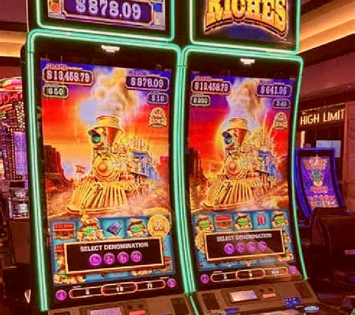 Alice Riches slot machine
